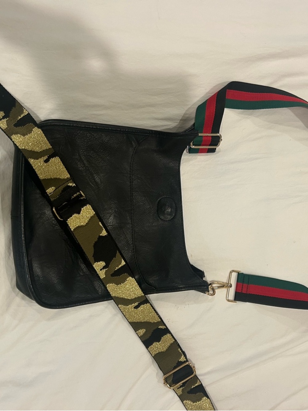 Black leather Crossbody Bag with Gold Hardware and Removable Patterned Straps